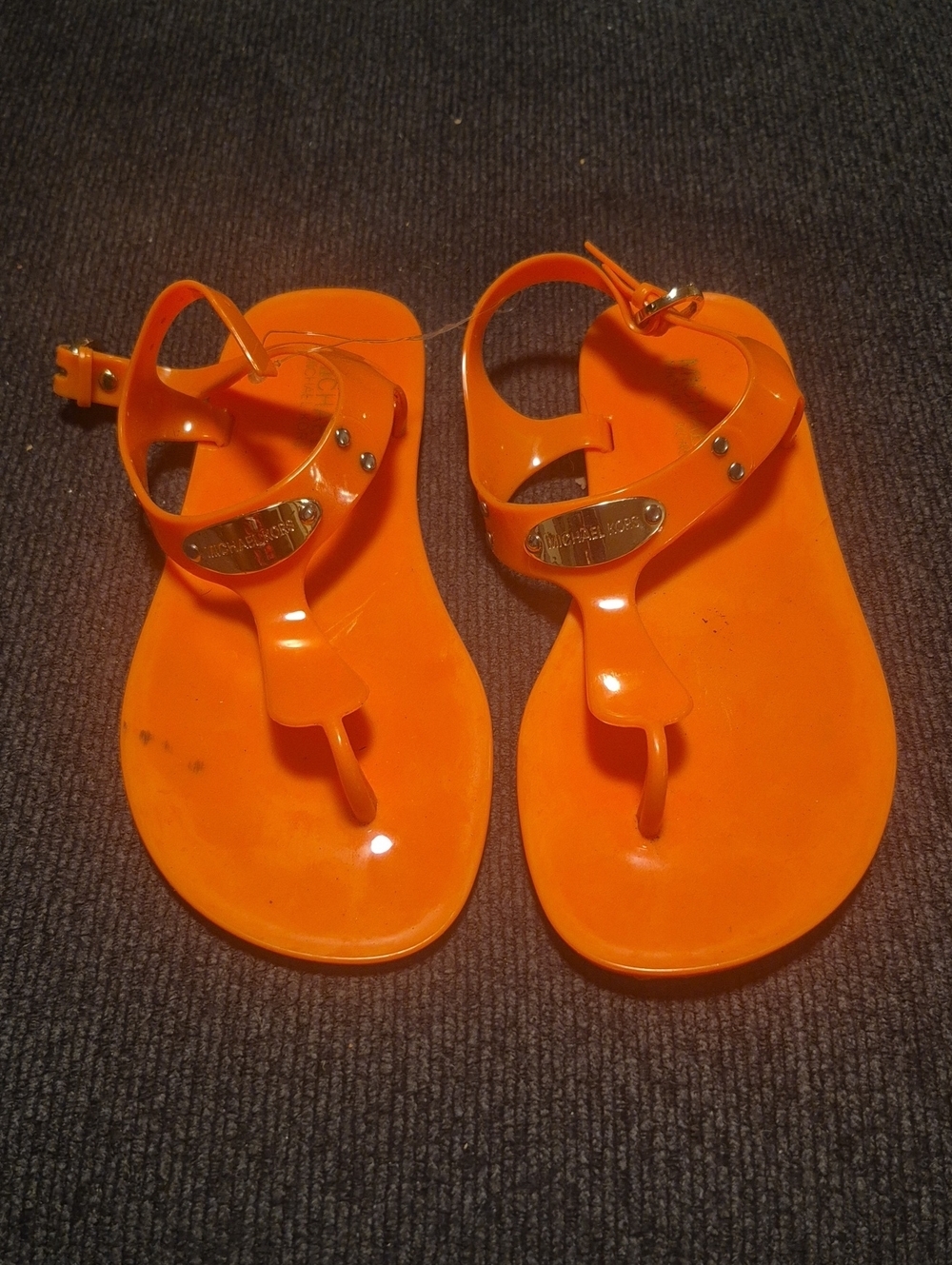 Michael Kors Bright Orange Jelly Thong Sandals with Gold Plaque